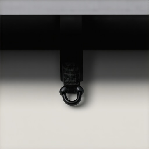 Properly bundled cables passing through a desk grommet with a healthy bend radius to prevent wire damage.